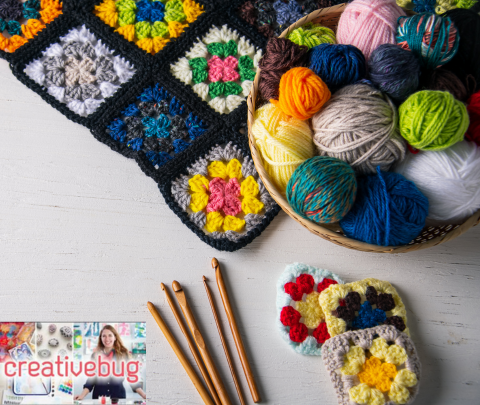 image of yarn, crochet hooks, and crocheted granny squares