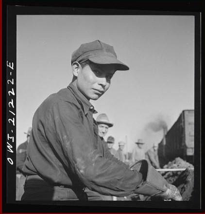 Black & white slide showing a railroad worker from the early 1900s