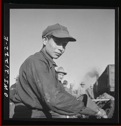 Black & white slide showing a railroad worker from the early 1900s