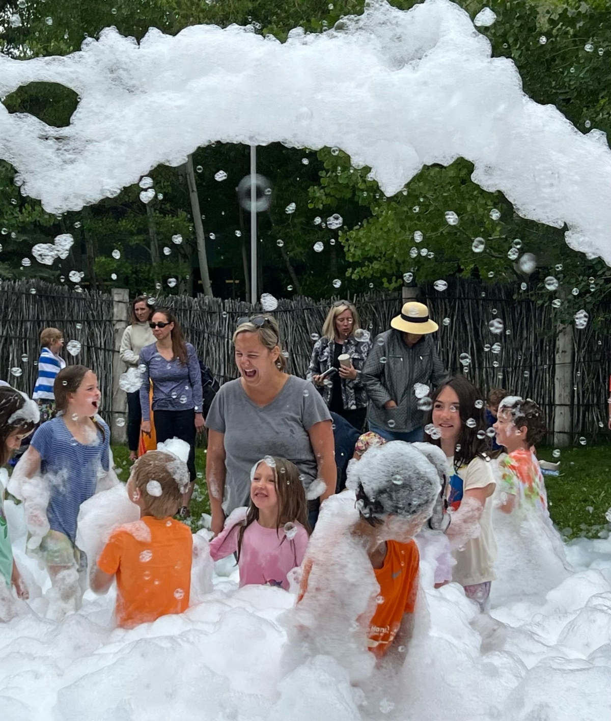 image of children playing in a foam cloud