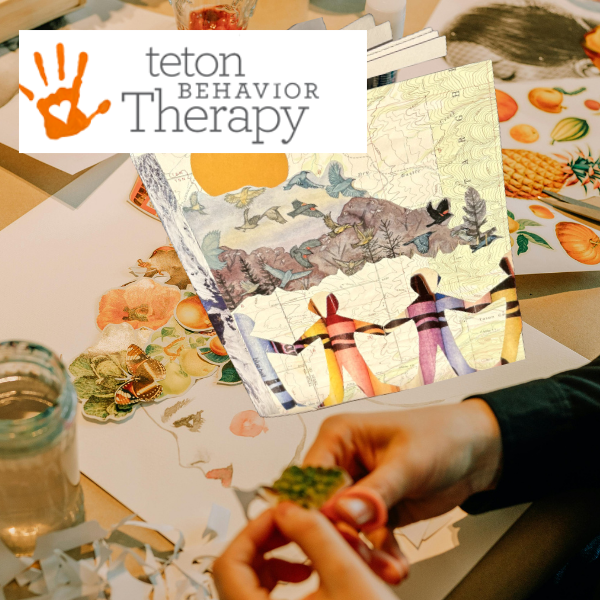 image of hands cutting paper and collage pieces laid out on a work surface